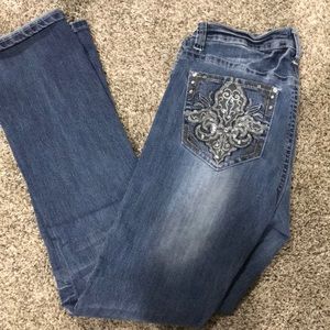 New Directions Blue jeans with rhinestone pockets.
